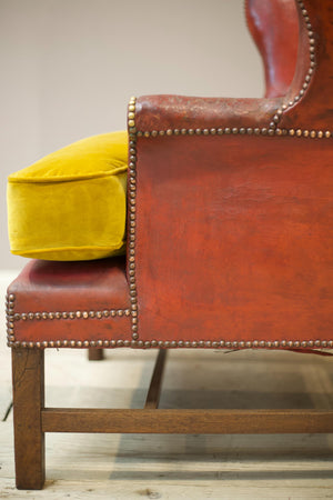 19th century red leather wingback armchair