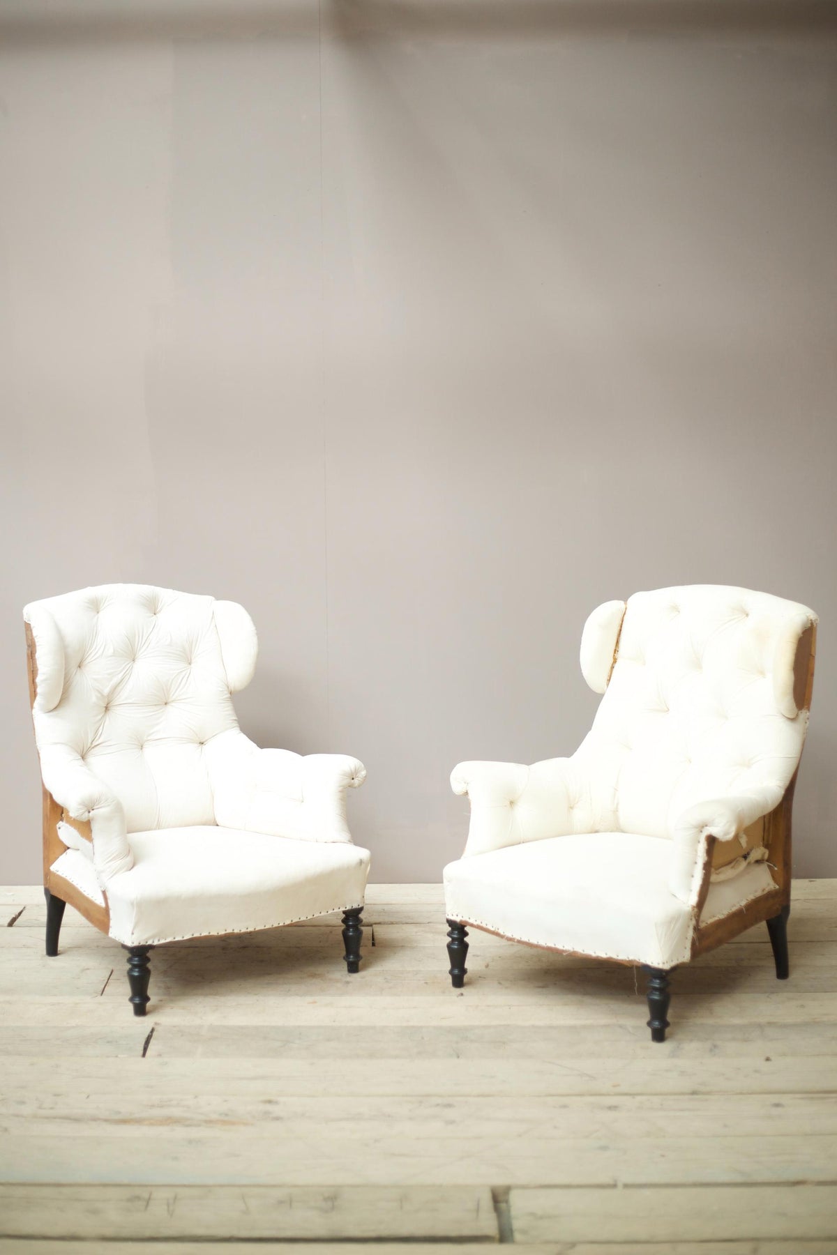 Pair of Napoleon III Buttoned wingback armchairs - TallBoy Interiors
