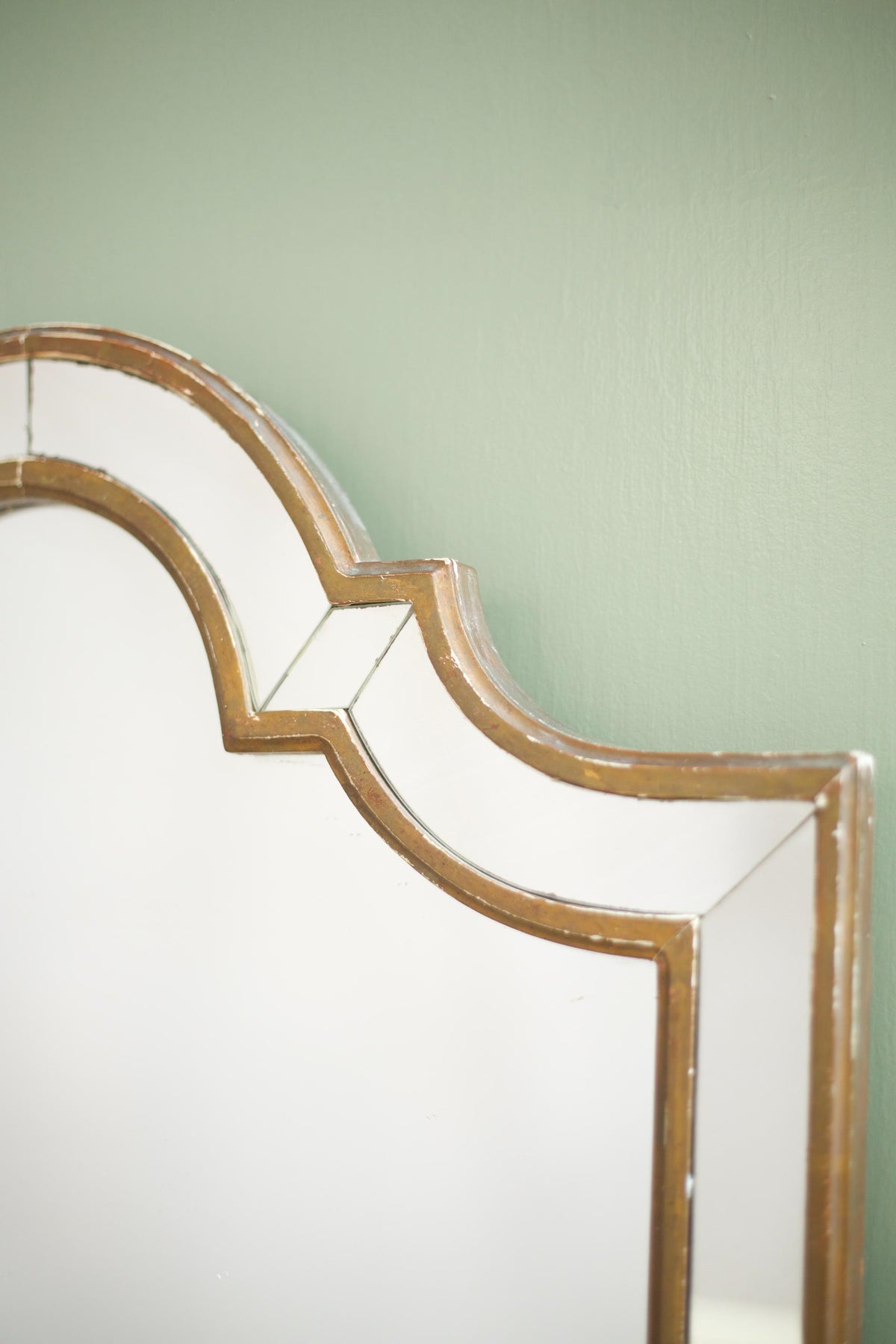 Unusual shaped early 20th century gilt mirror - TallBoy Interiors