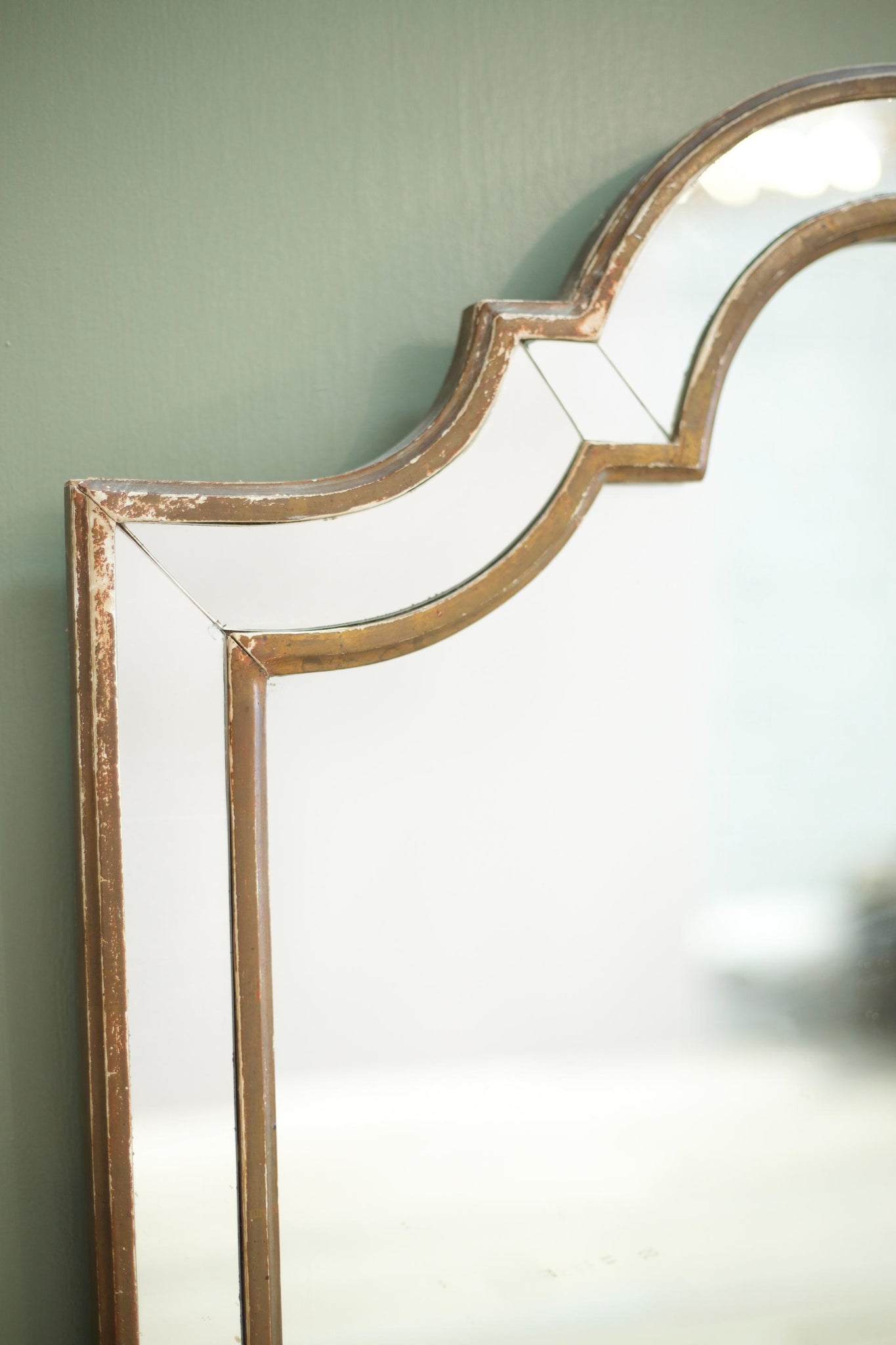Unusual shaped early 20th century gilt mirror