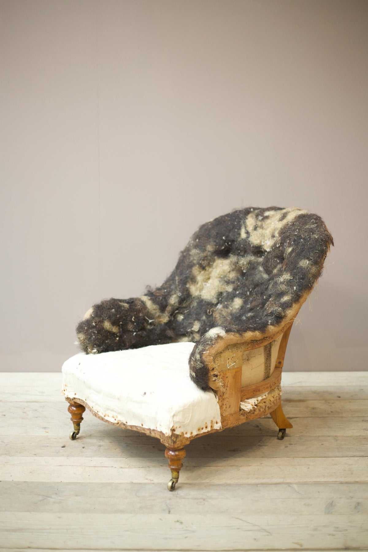 19th century Howard and sons style curved back armchair - TallBoy Interiors