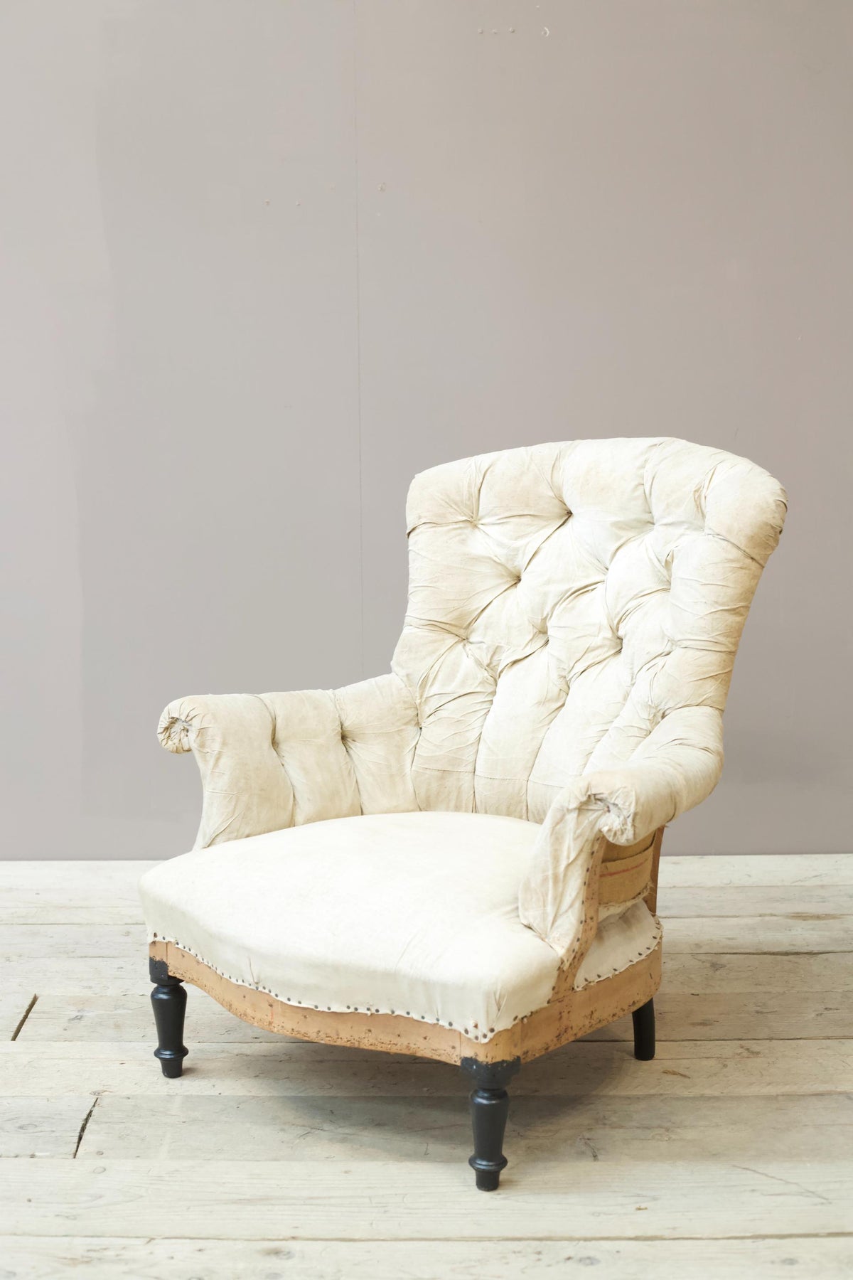 Napoleon III buttoned curved back armchair - TallBoy Interiors