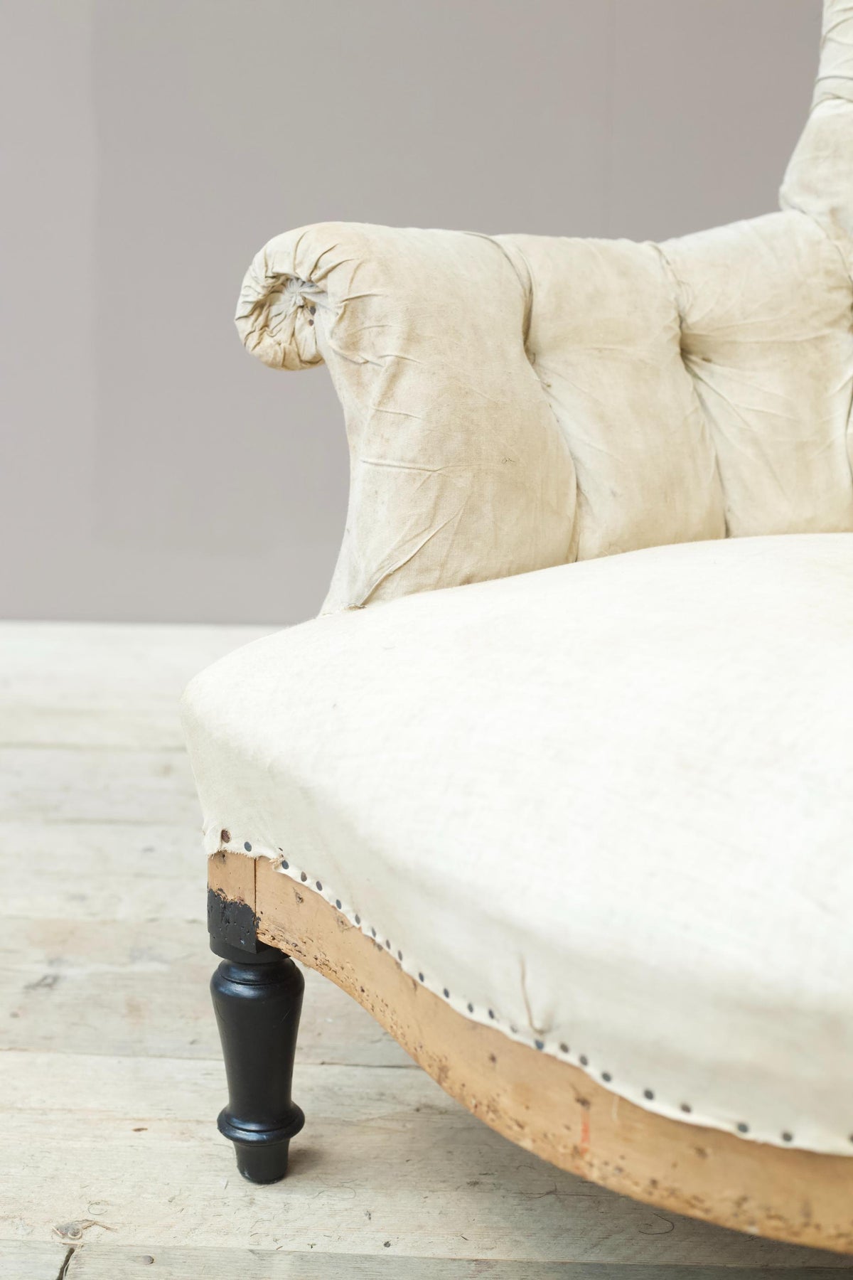 Napoleon III buttoned curved back armchair - TallBoy Interiors