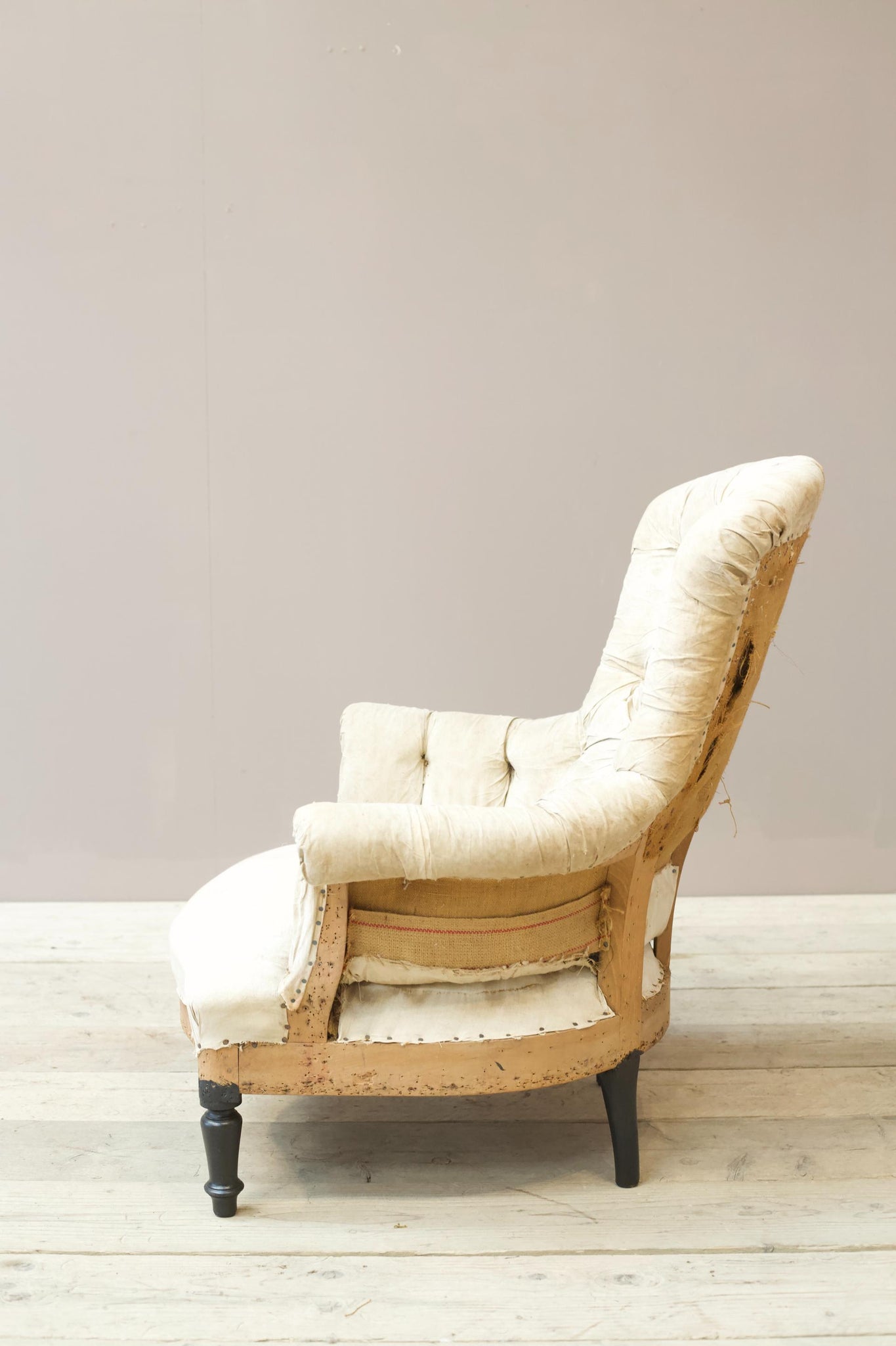 Napoleon III buttoned curved back armchair