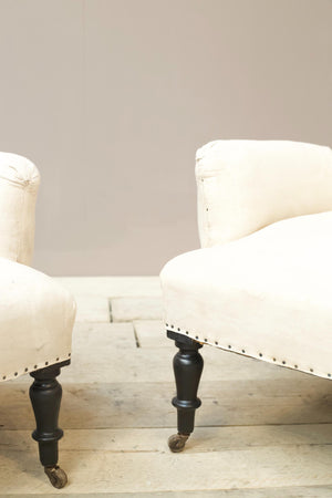 Pair of Napoleon III cushioned arm armchairs