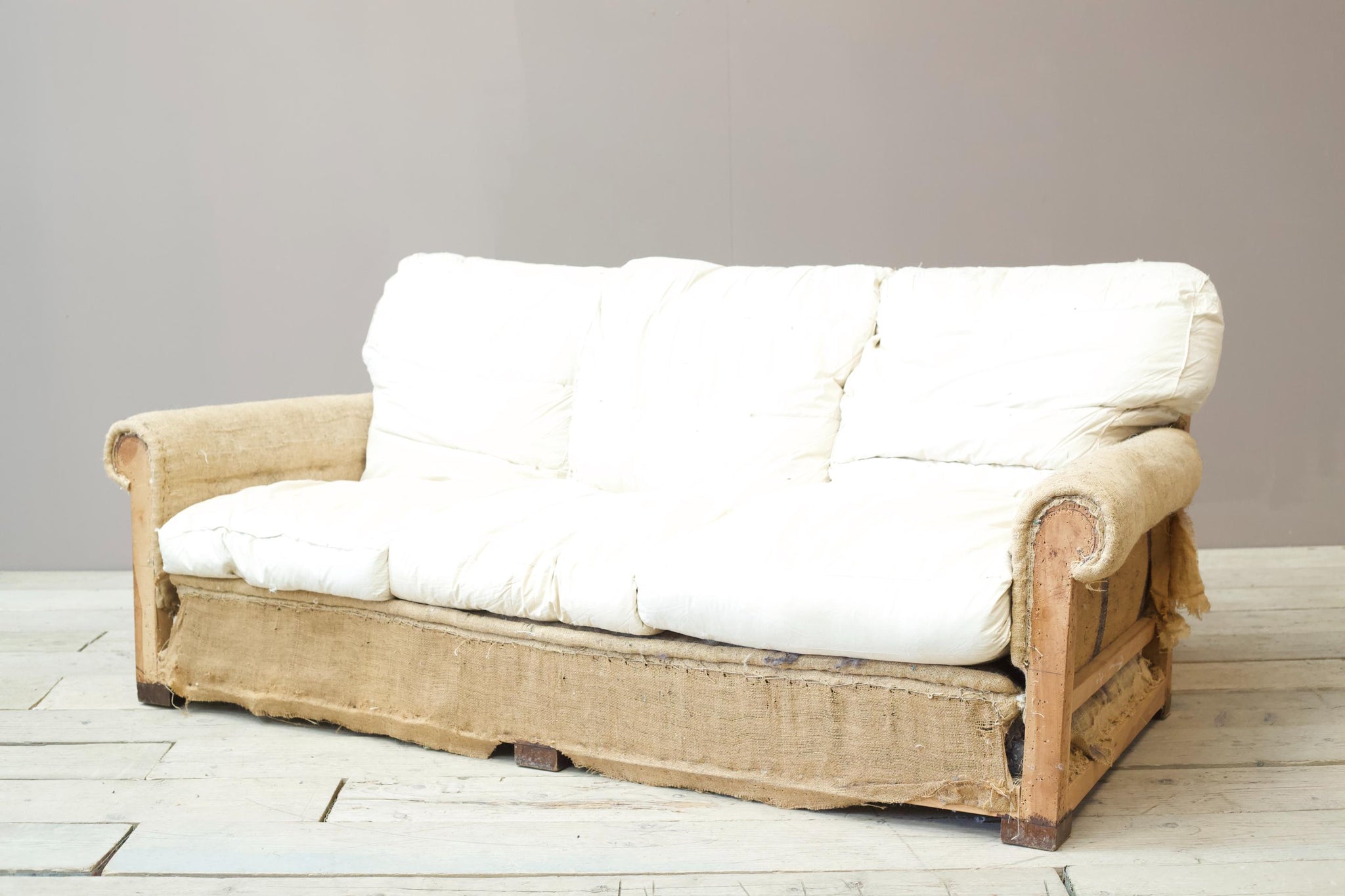 Early 20th century English country house cushioned back sofa