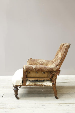Victorian English country house armchair with buttoned back