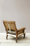 Victorian English country house armchair with buttoned back