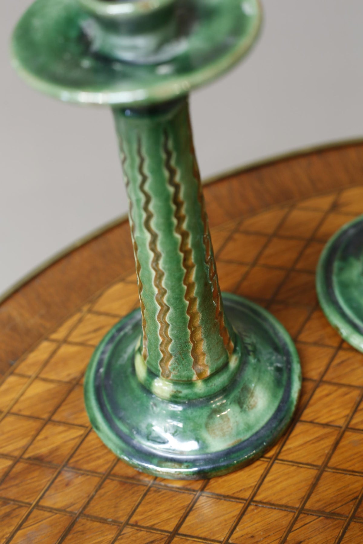 Pair of early 20th century Spanish Green glazed candle sticks - TallBoy Interiors