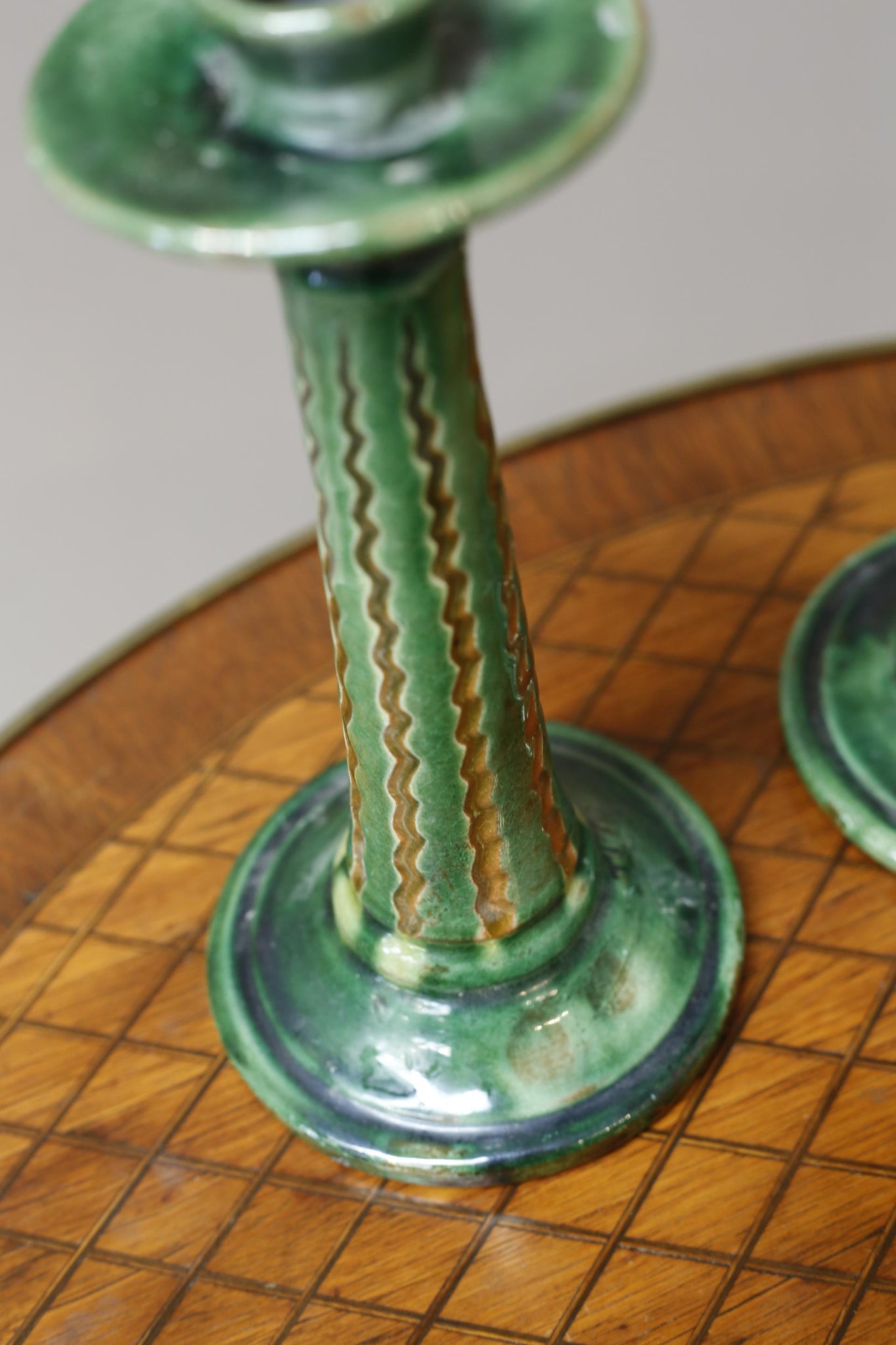 Pair of early 20th century Spanish Green glazed candle sticks