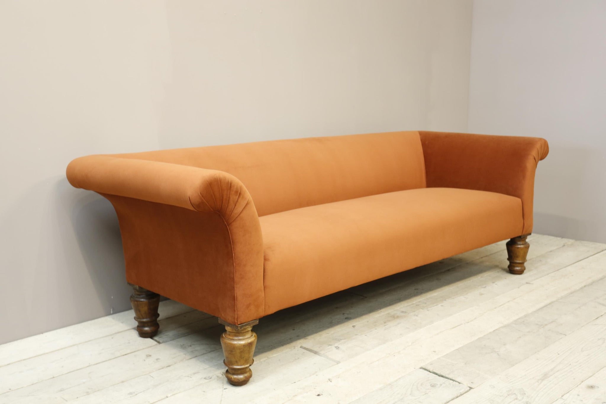 Victorian country house sofa in rust velvet