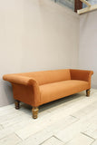 Victorian country house sofa in rust velvet