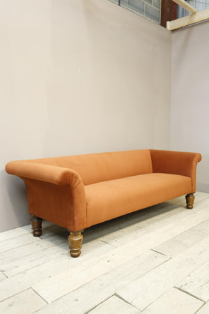 Victorian country house sofa in rust velvet