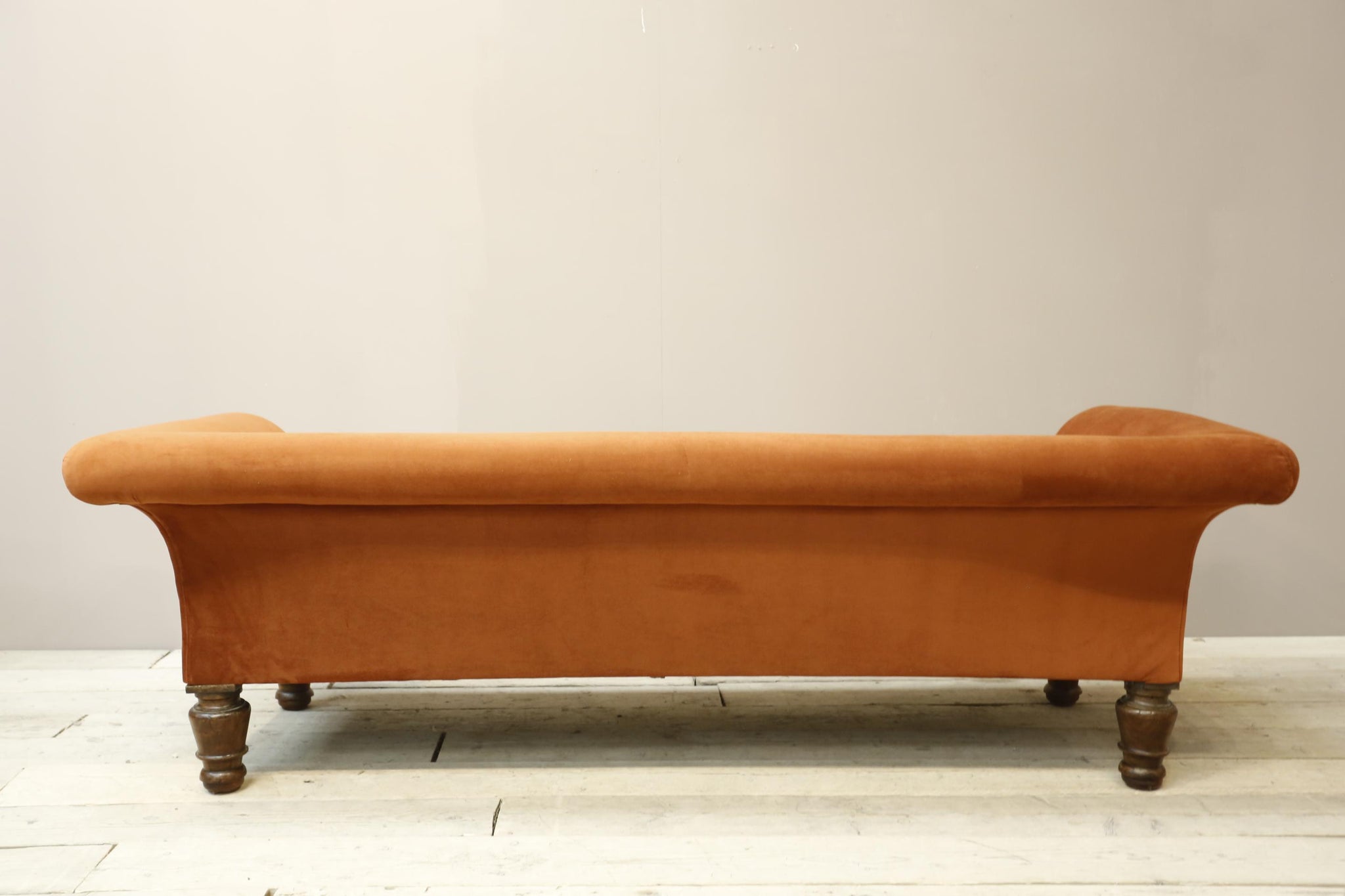 Victorian country house sofa in rust velvet