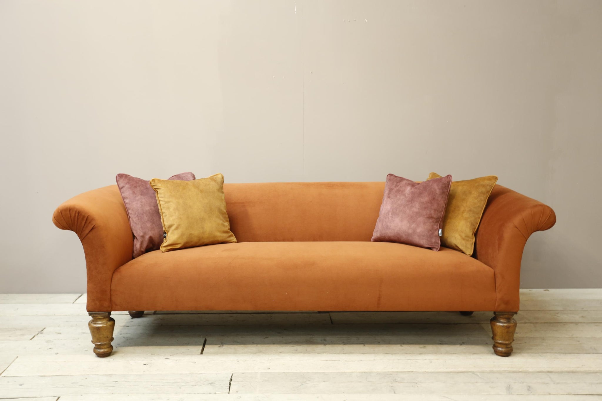 Victorian country house sofa in rust velvet