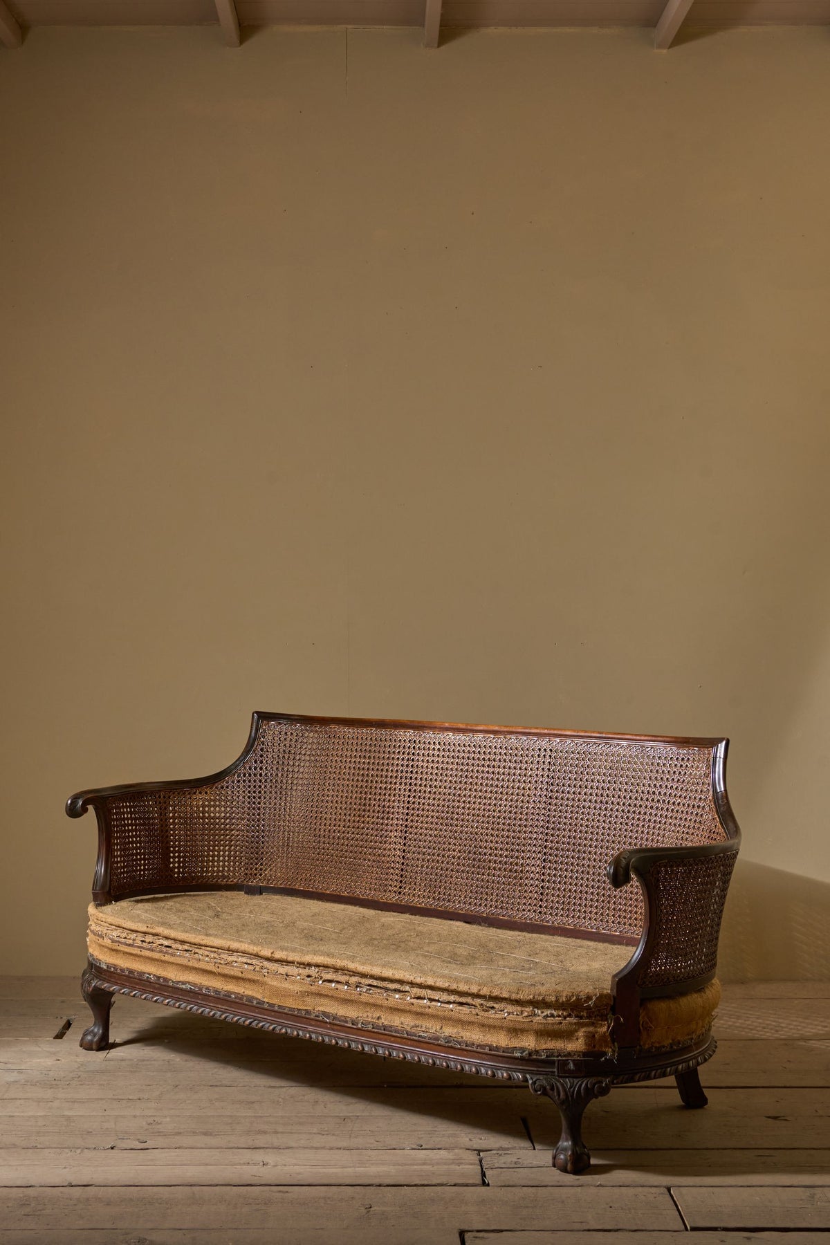 c.1900 Bergere sofa with shapely arms - TallBoy Interiors