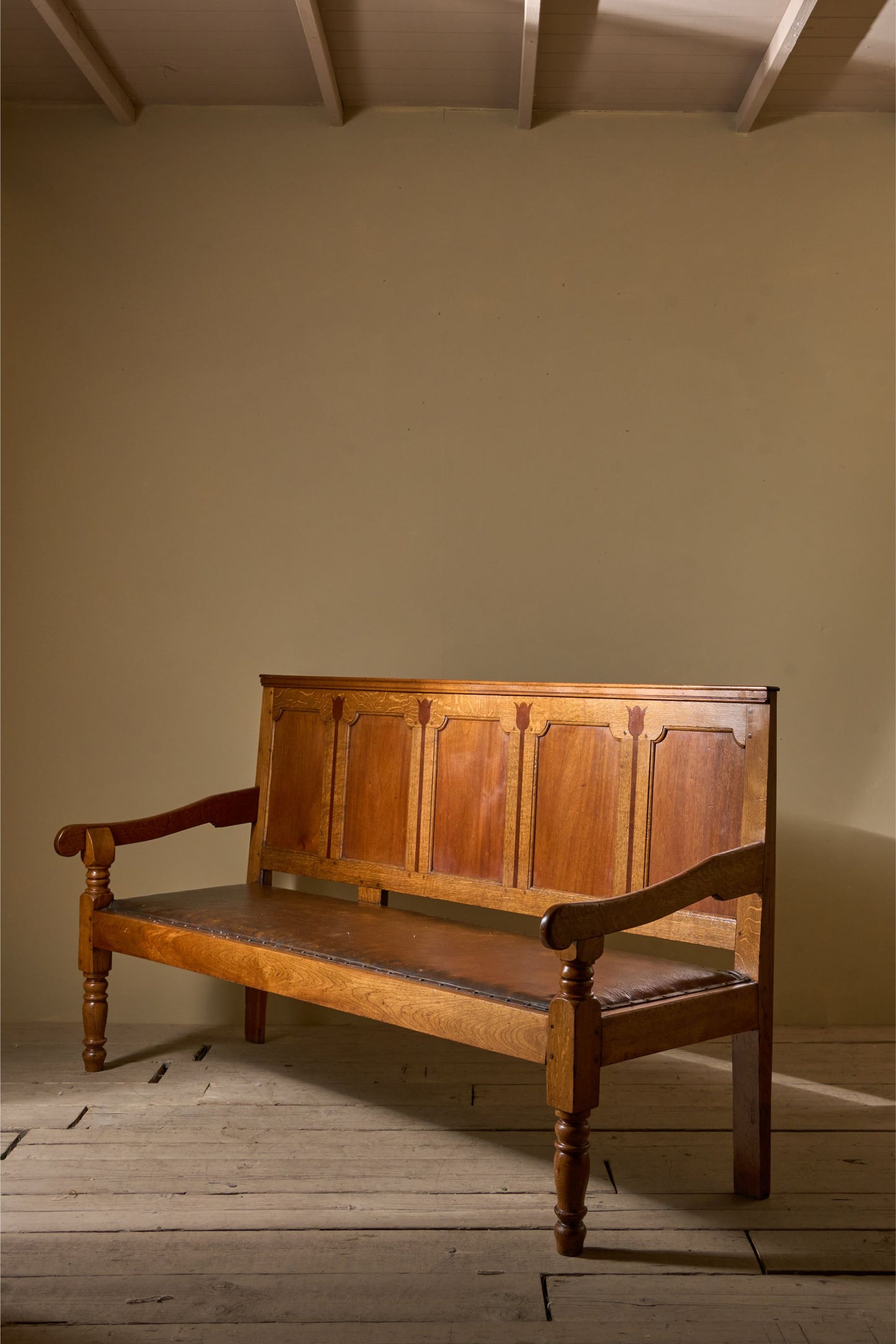 Georgian oak hall bench with tulip decoration