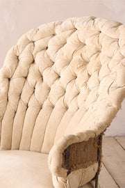 19th century French buttoned iron back armchair