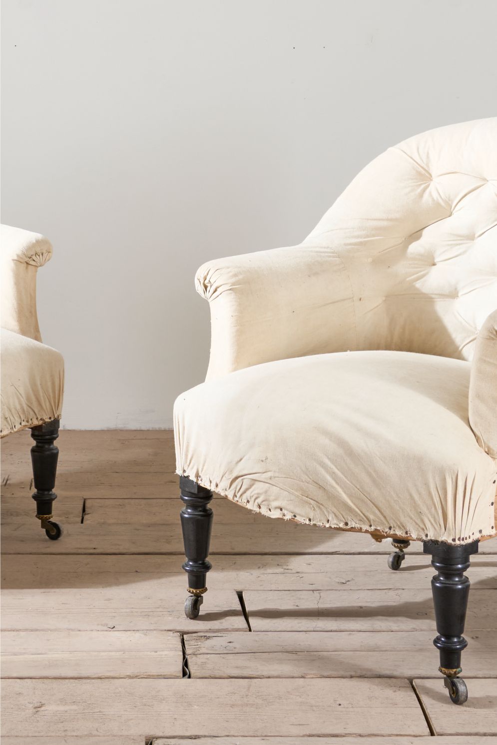 Pair of Napoleon III elegant buttoned tub chairs