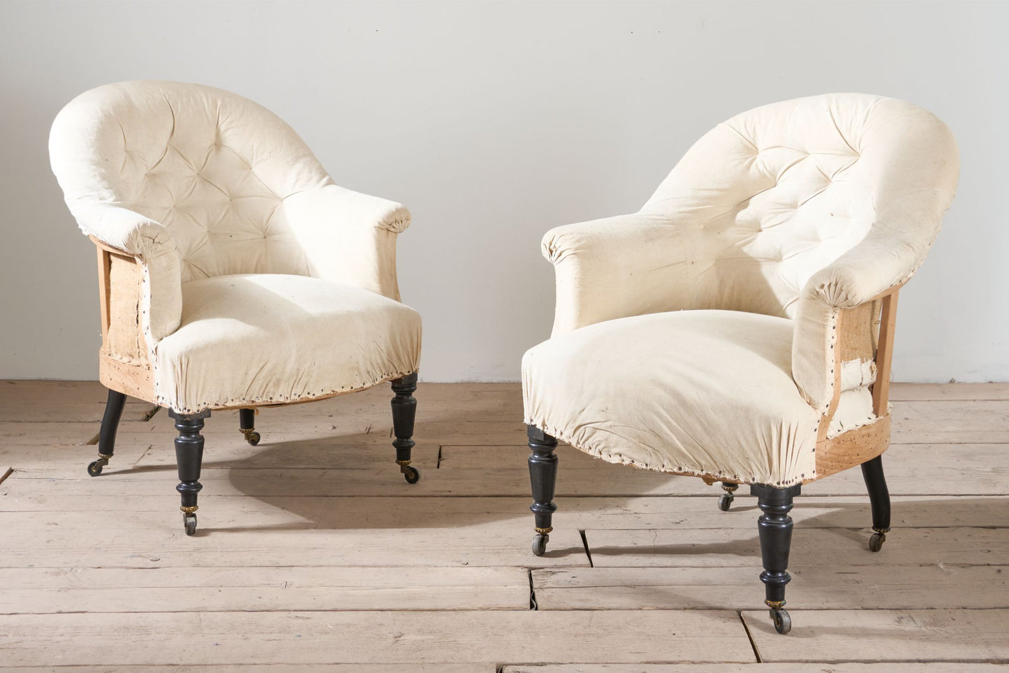 Pair of Napoleon III elegant buttoned tub chairs
