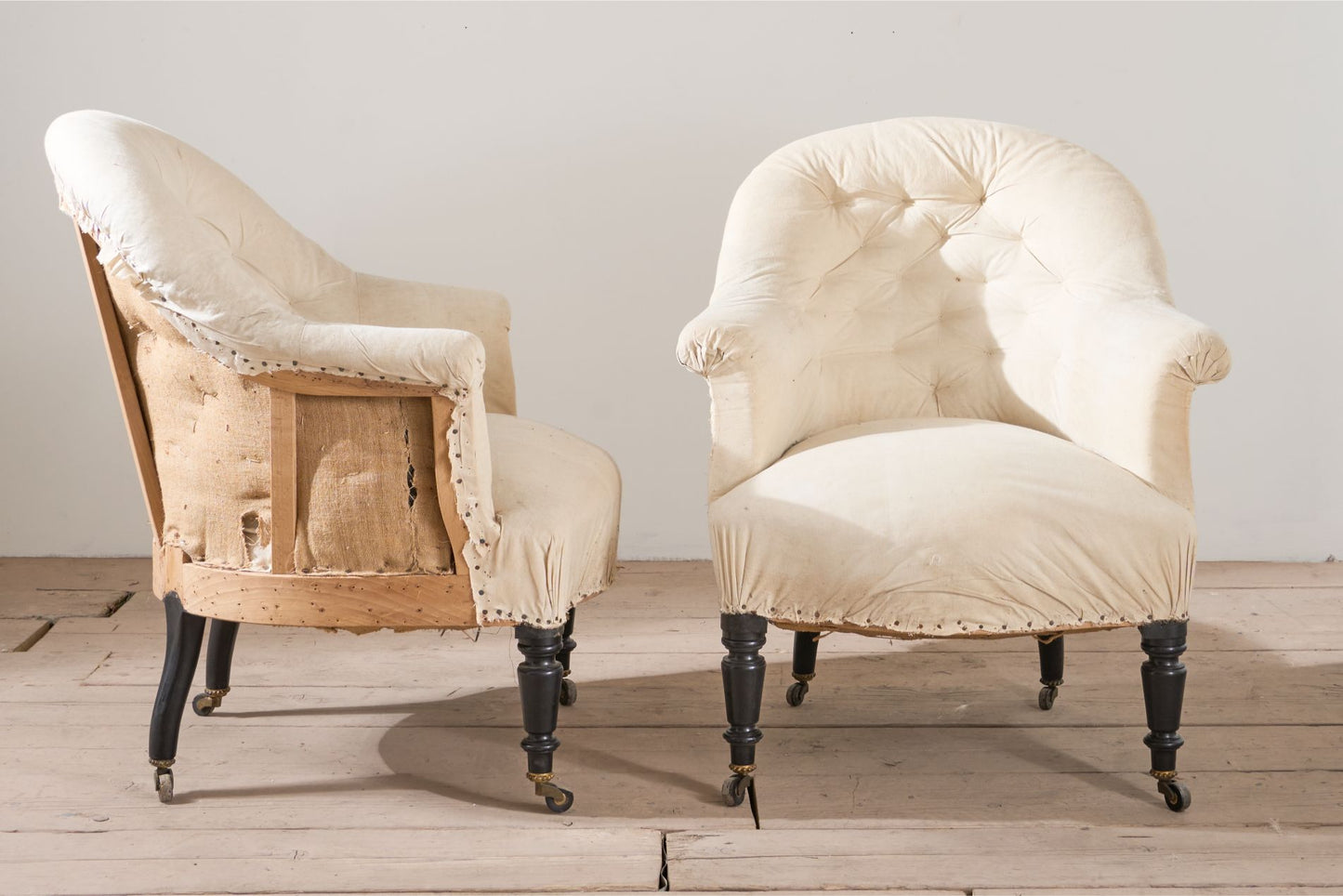 Pair of Napoleon III elegant buttoned tub chairs