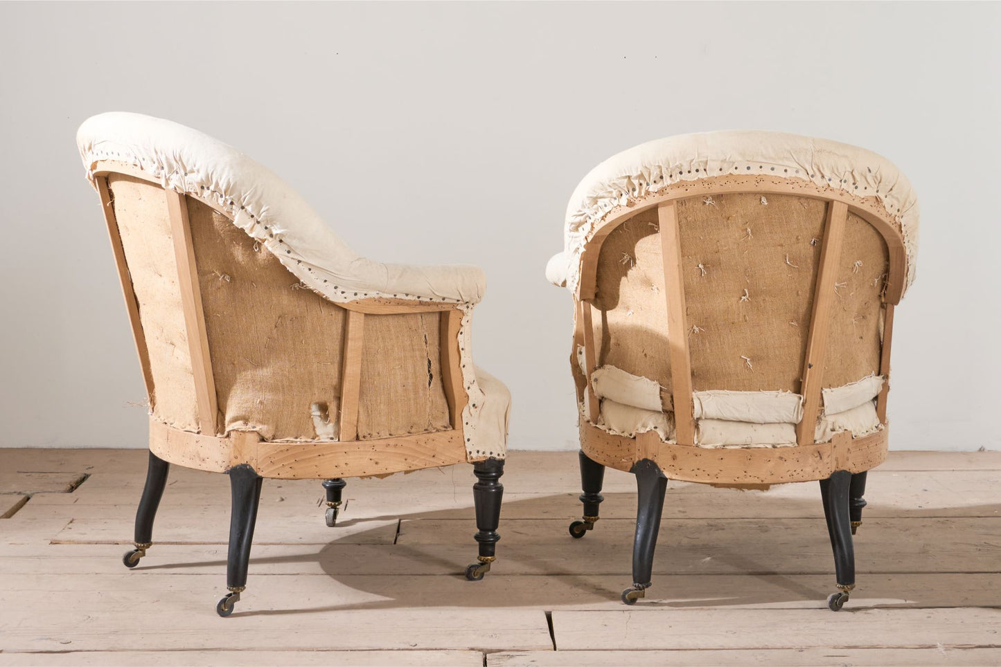Pair of Napoleon III elegant buttoned tub chairs
