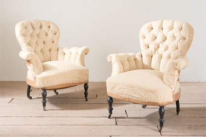 Pair of Napoleon III buttoned spoon back armchairs