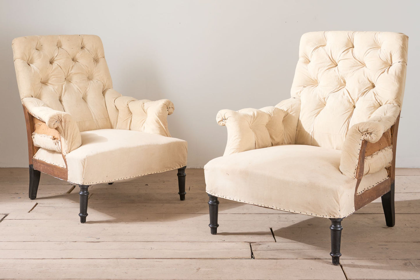 Pair of Napoleon III buttoned square back armchairs