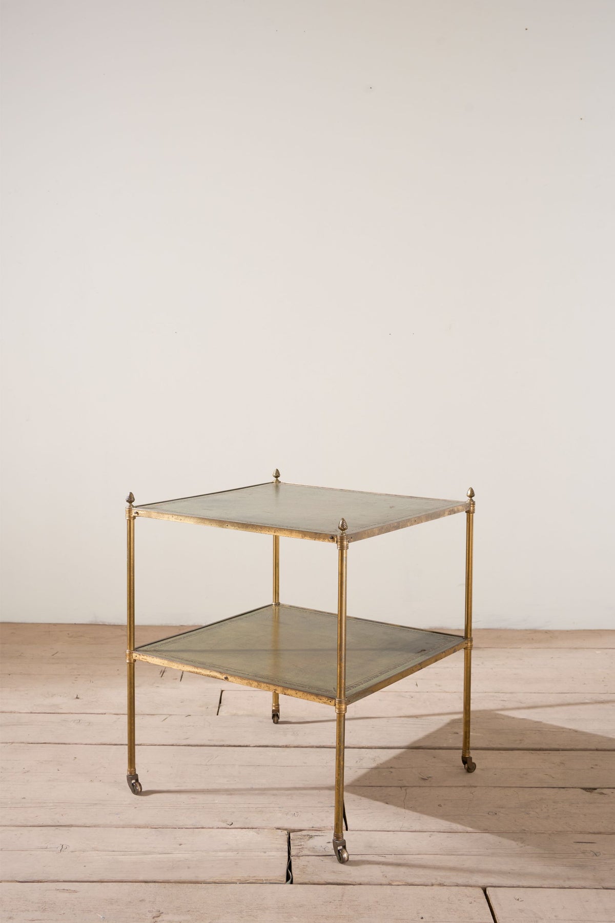 Early 20th century Green leather and brass side table - TallBoy Interiors