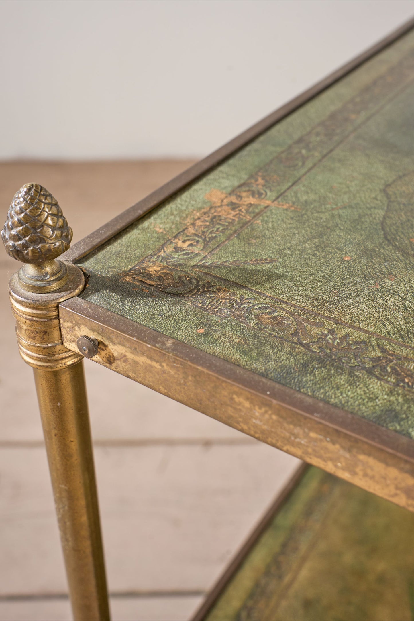 Early 20th century Green leather and brass side table