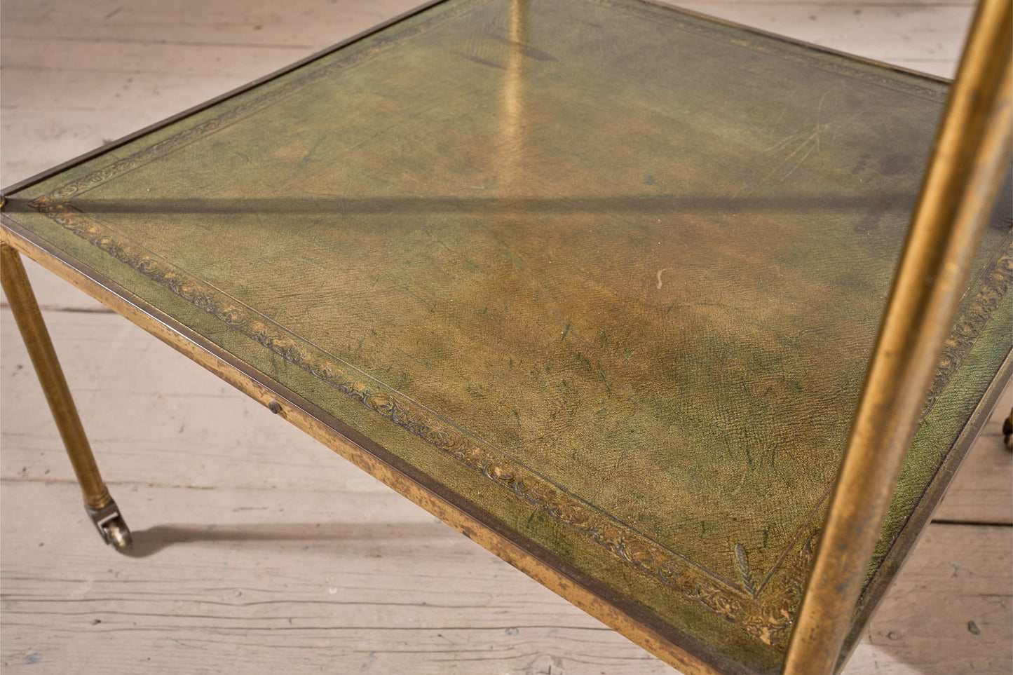 Early 20th century Green leather and brass side table