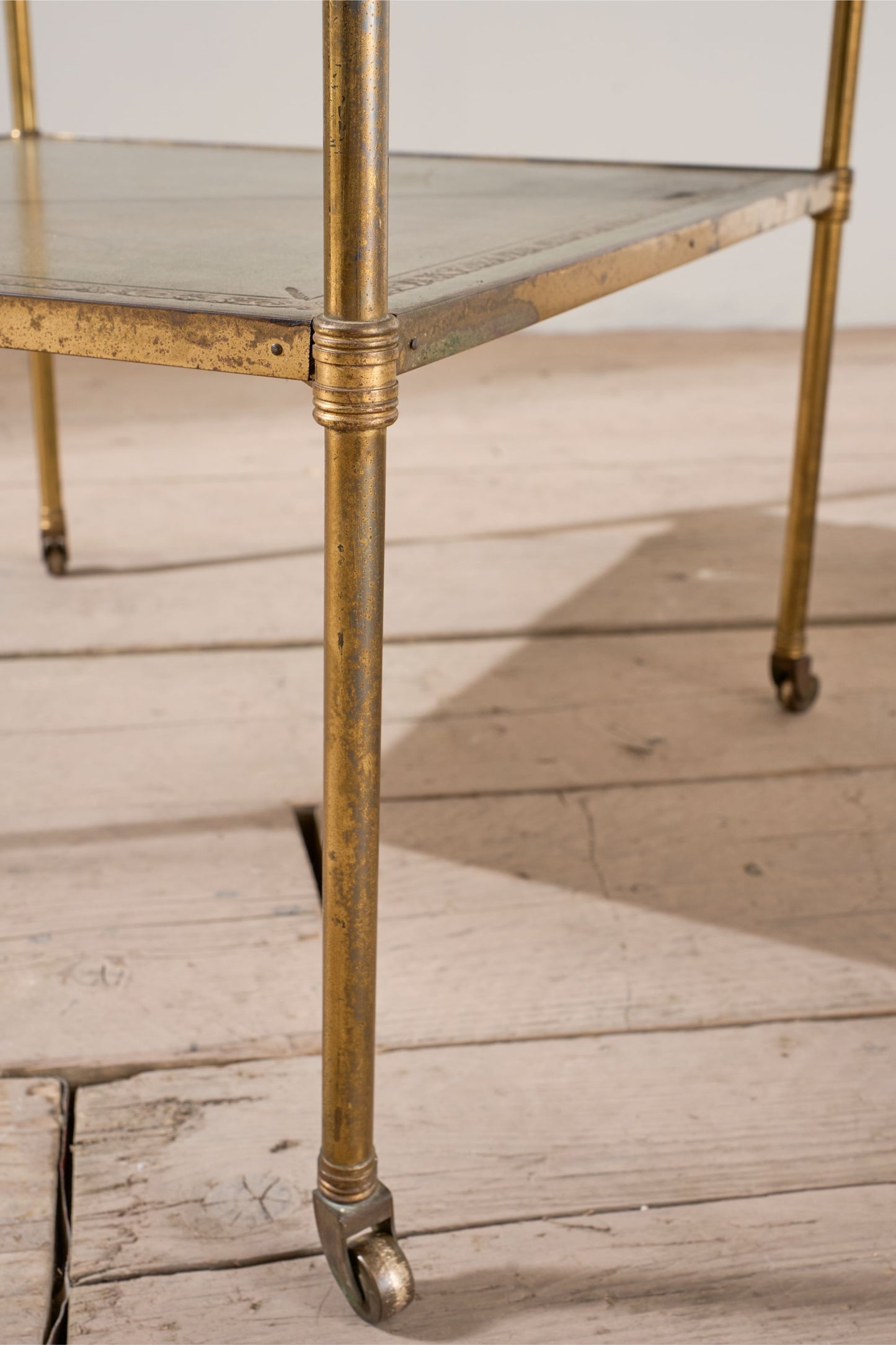 Early 20th century Green leather and brass side table