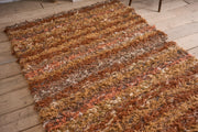 British made Selvedge rug - orange and browns