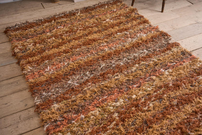 British made Selvedge rug - orange and browns