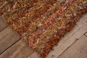British made Selvedge rug - orange and browns