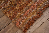 British made Selvedge rug - orange and browns