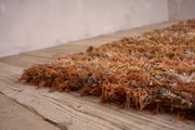 British made Selvedge rug - orange and browns