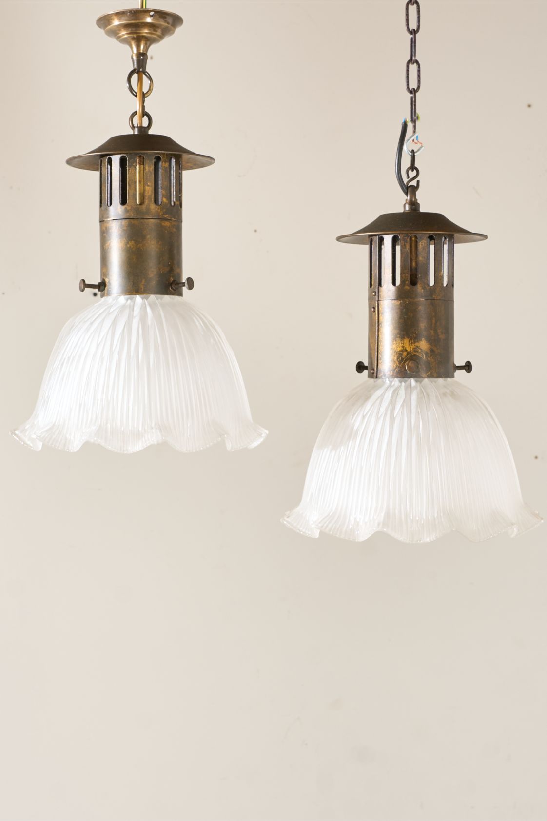Trio of 20th century Holophane pendant lights