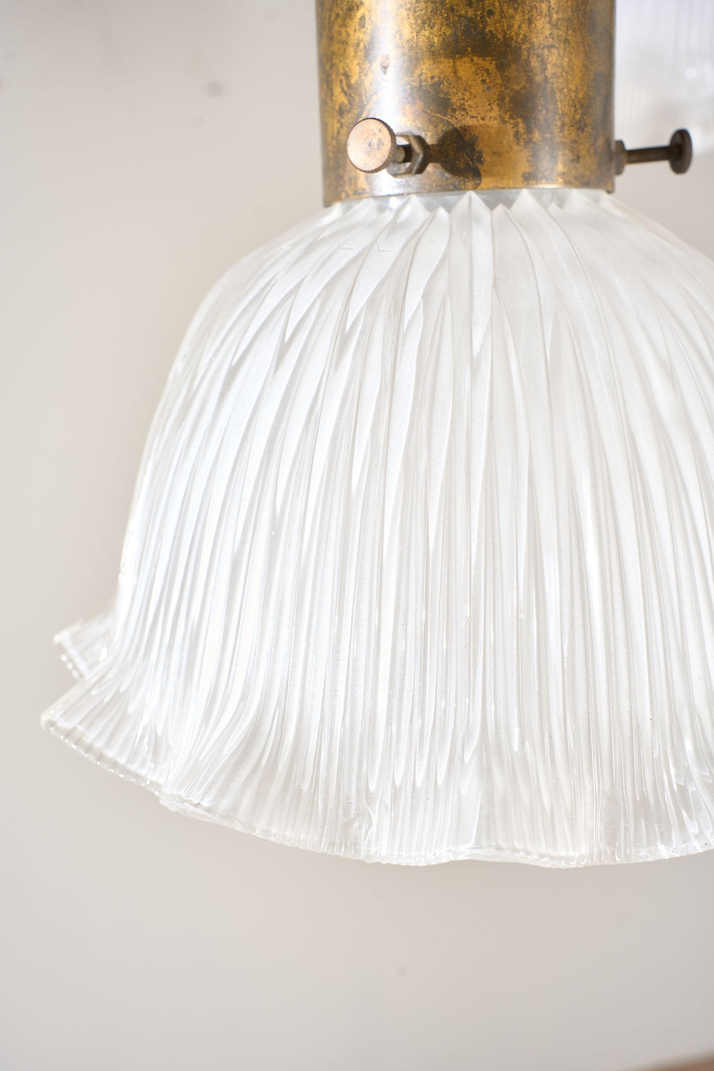 Trio of 20th century Holophane pendant lights