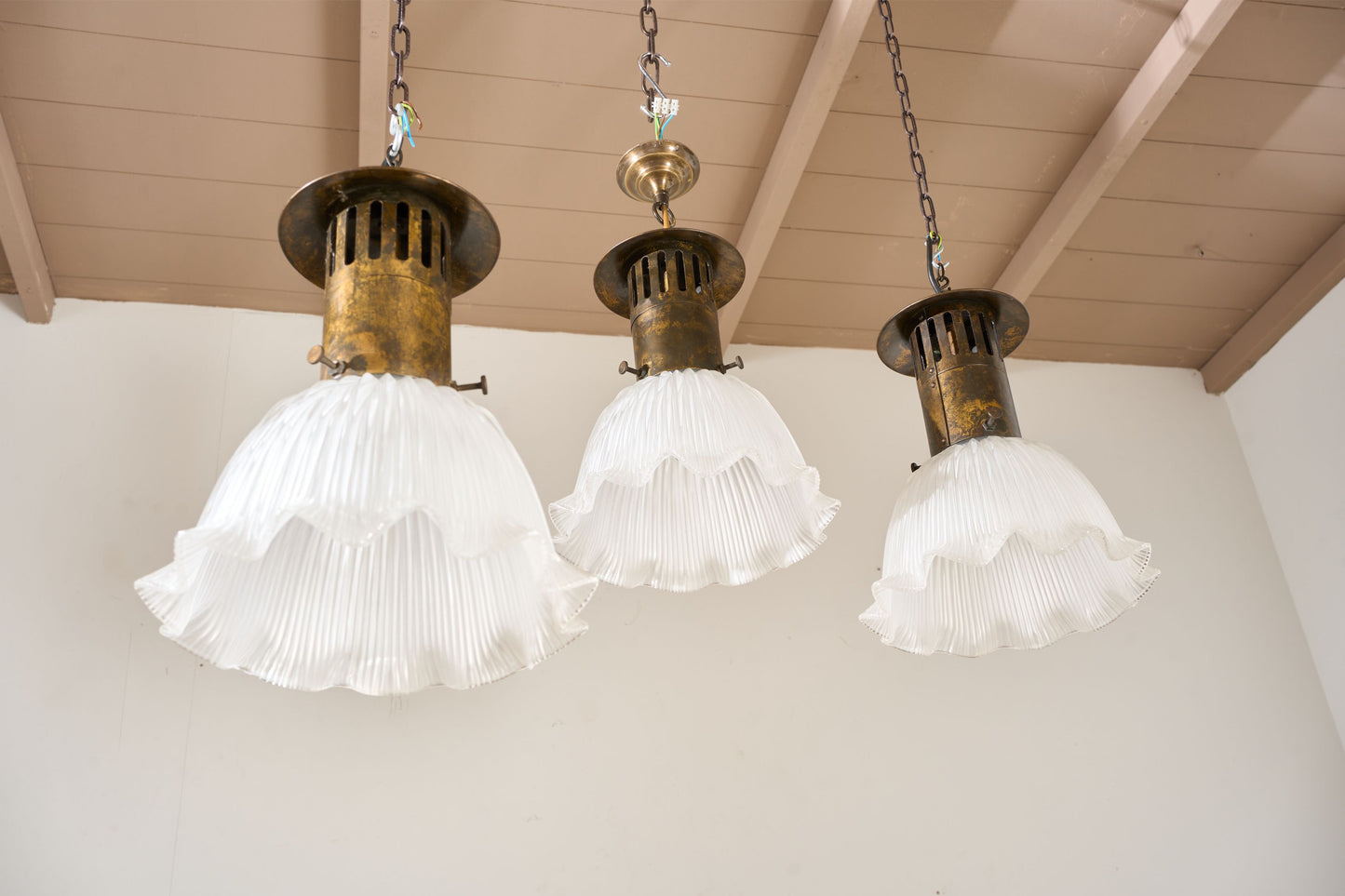 Trio of 20th century Holophane pendant lights