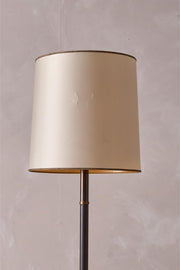 Mid century brown leather and brass floor lamp