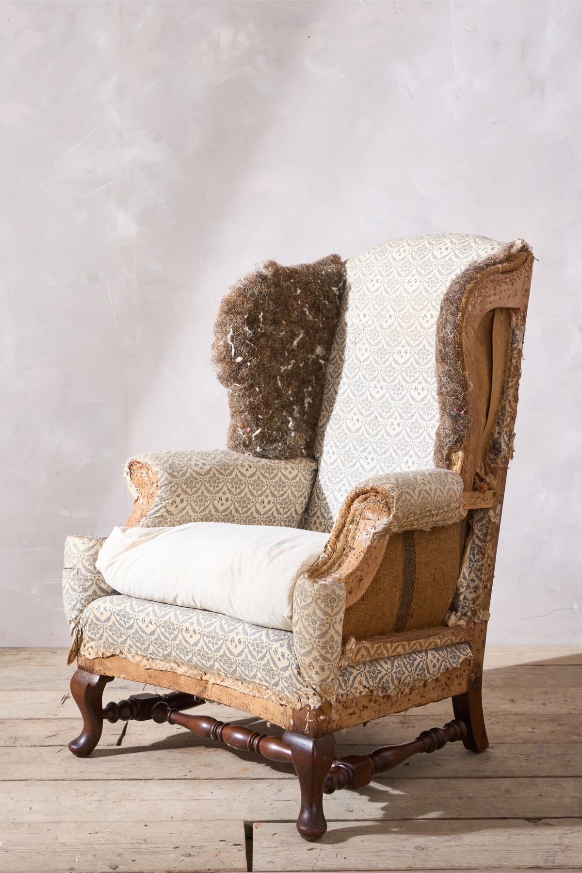 19th century Howard and sons Ennismore Wingback armchair - TallBoy Interiors