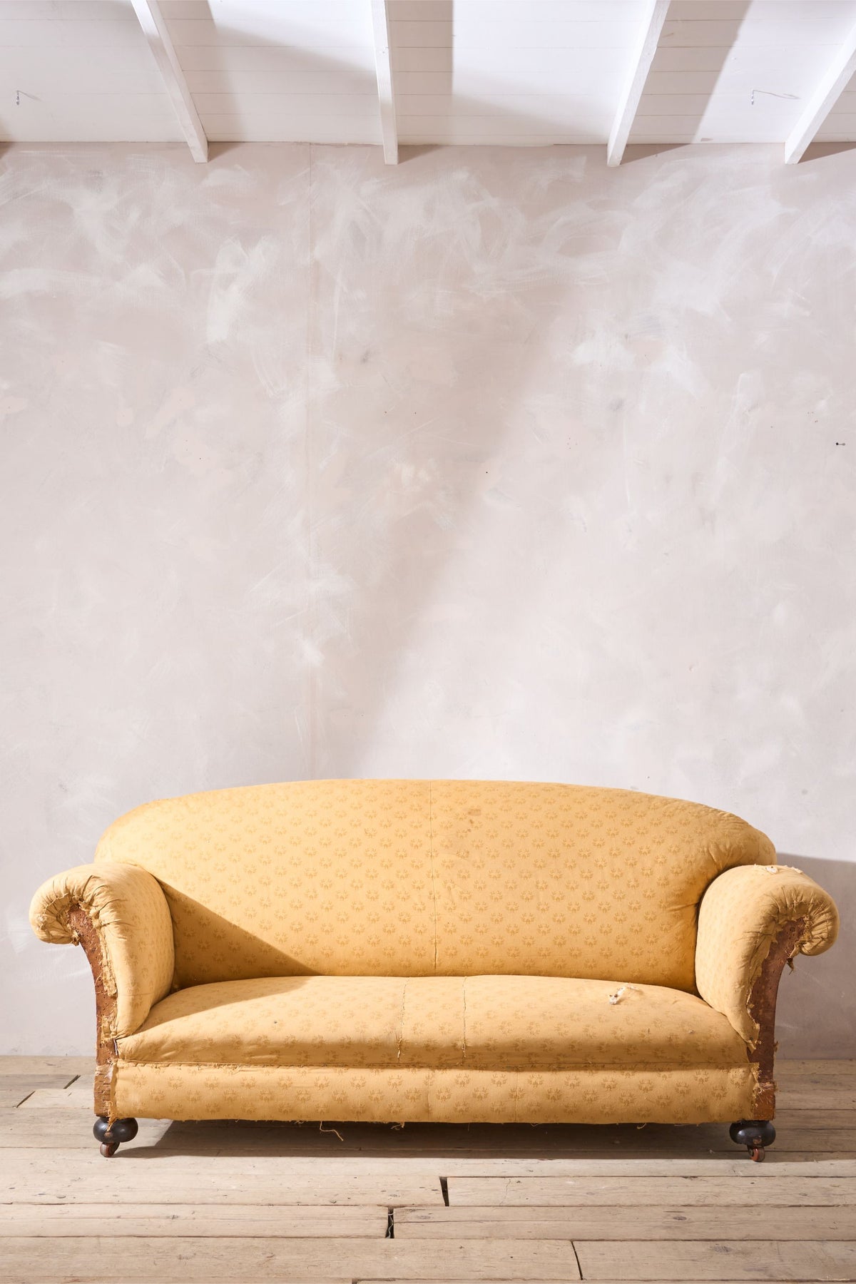 c.1900 Curved back English country house sofa - TallBoy Interiors
