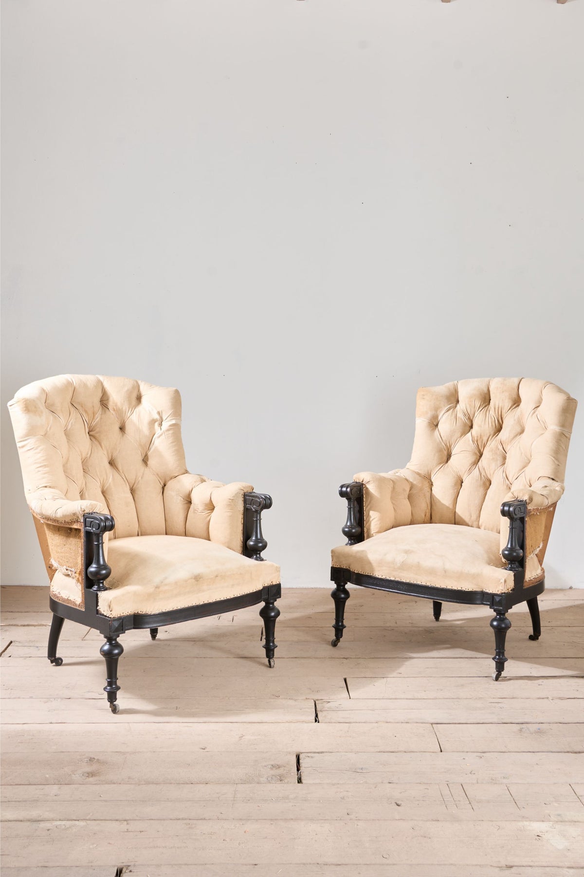 Pair of Napoleon III large buttoned shield back armchairs - TallBoy Interiors