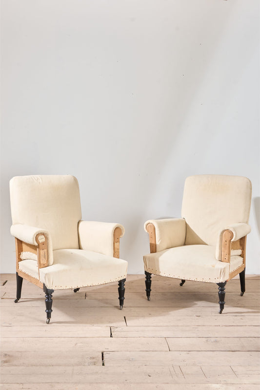 Pair of Napoleon III square back armchairs on tall legs