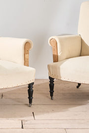 Pair of Napoleon III square back armchairs on tall legs