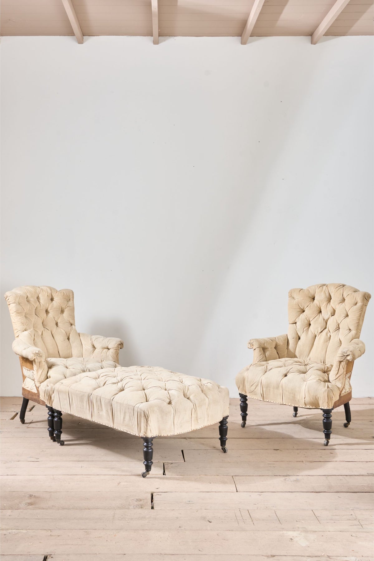 Rare Napoleon III pair of Buttoned back and seat armchairs with matching stool - TallBoy Interiors