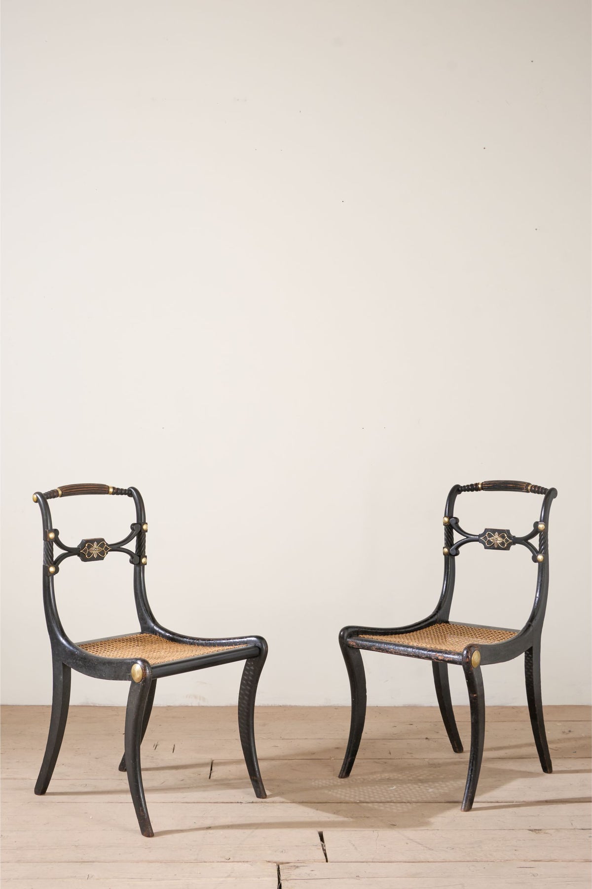 Pair of Regency Ebonised side chairs