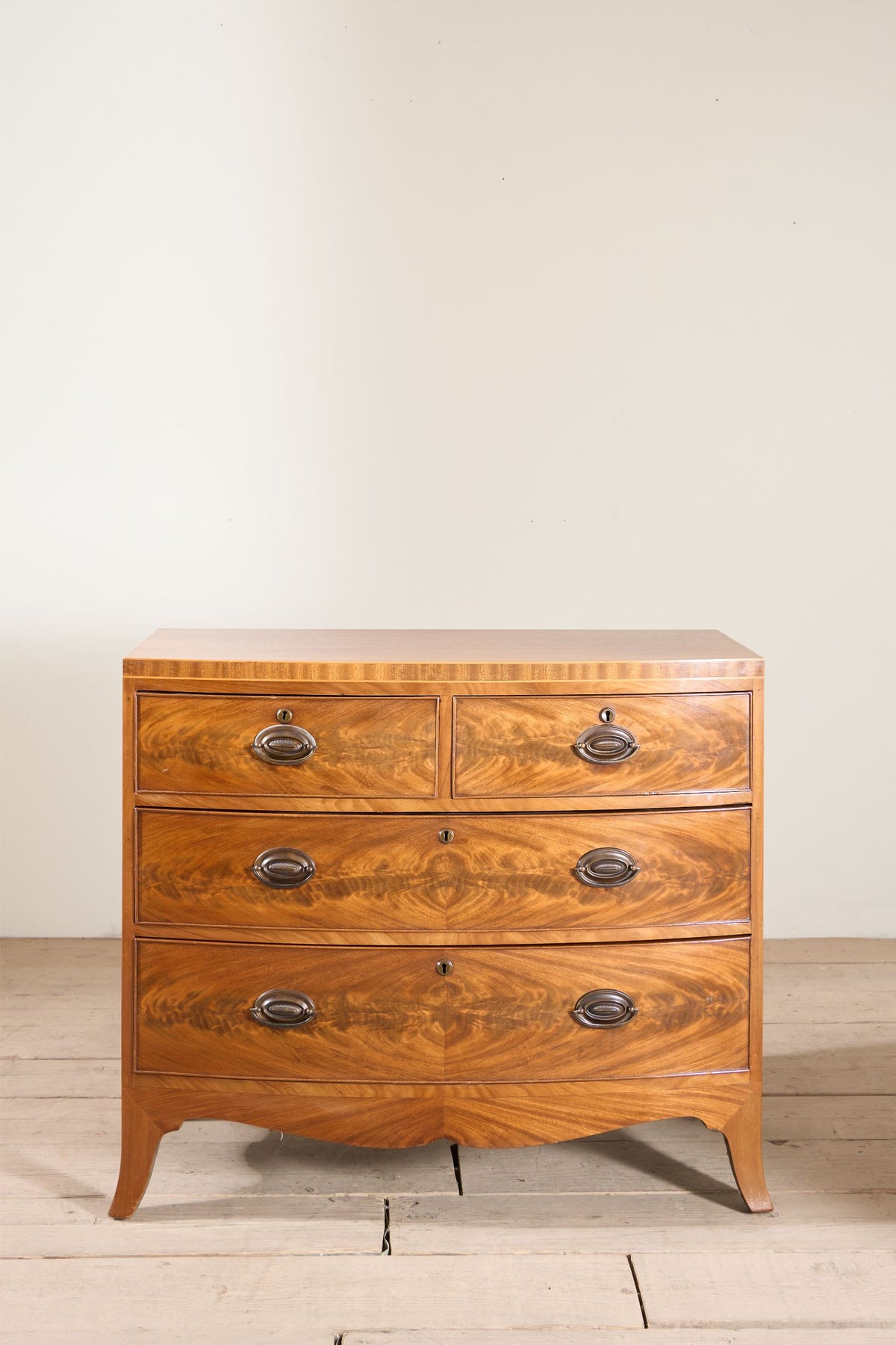 Early 20th century Bow fronted mahogany chest of drawers - TallBoy Interiors