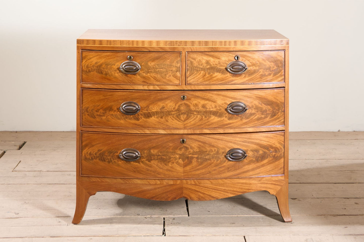 Early 20th century Bow fronted mahogany chest of drawers
